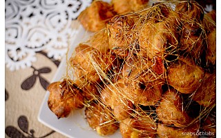 Croquembouche â€” custard-oozing toffee covered profiteroles